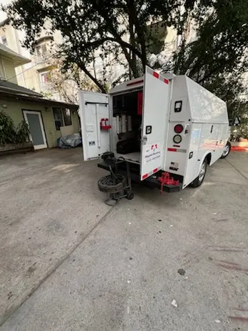 Magnet Plumbing service vehicle on-site for Water Heater Repair in La Fetra